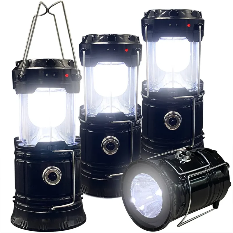 FOUR black collapsible LED camping lanterns, one extended and illuminated as a lantern, the other collapsed and illuminated as a flashlight.